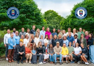 Group photo of the British International School Gdańsk Upper Primary and Secondary team, including IB Diploma Programme educators.